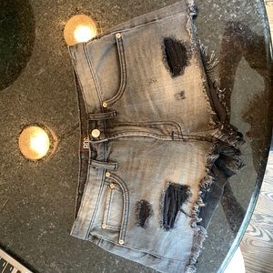 Distressed black ripped shorts by BDG